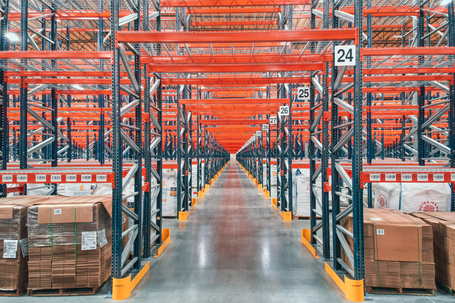 New warehouse rack system showing storage rows and aisle access