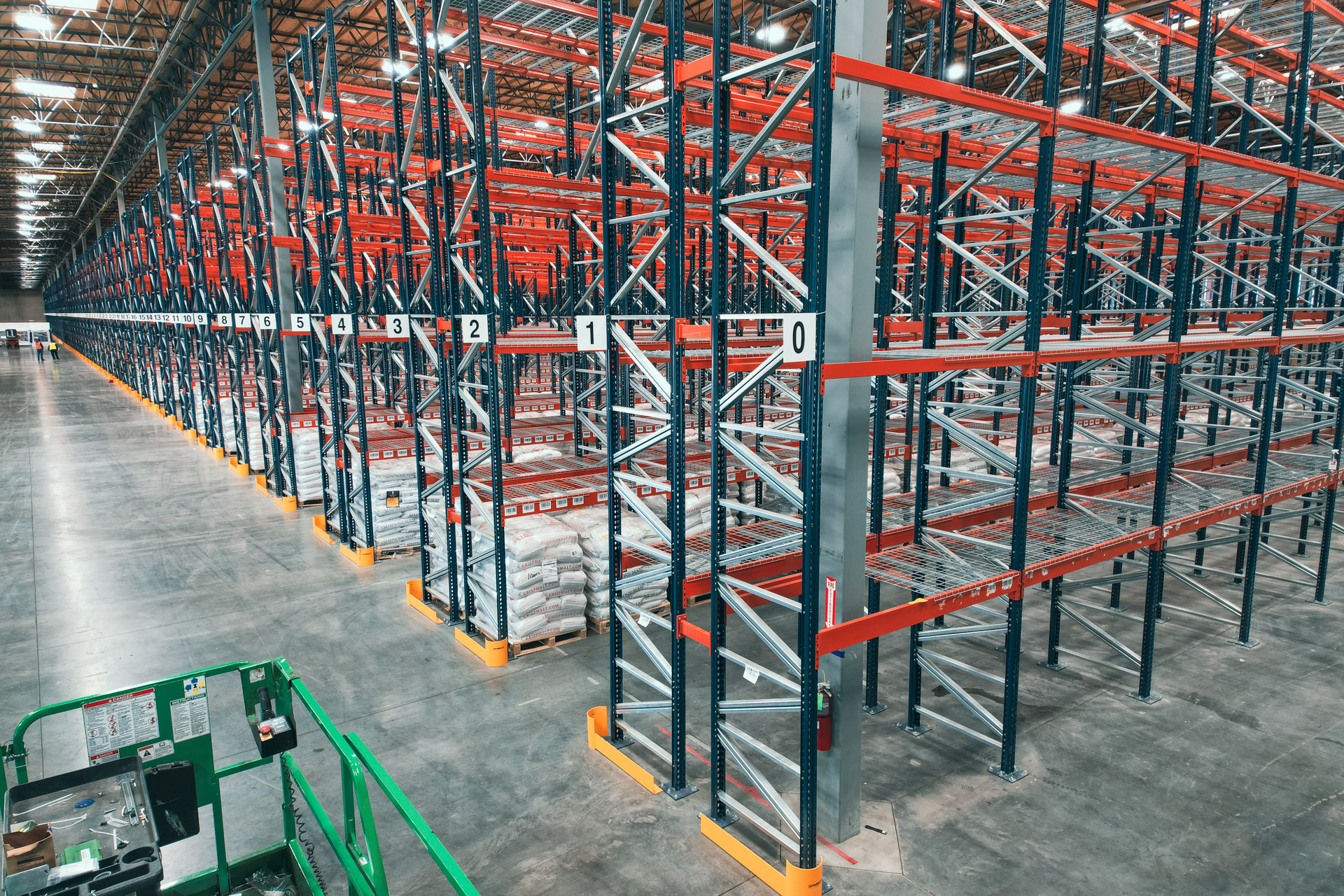 New warehouse rack system showing storage rows and aisle access
